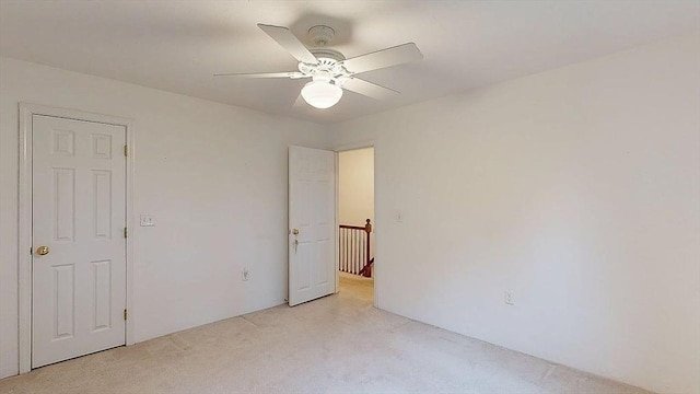 33 Cobblestone Ln Unit 33, Worcester, MA 01606 - unfurnished bedroom with light colored carpet and a ceiling fan