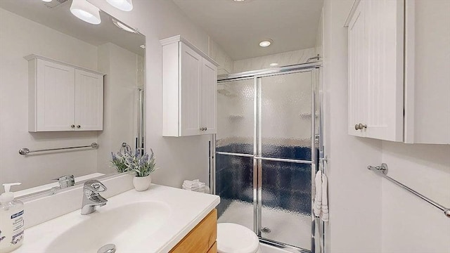 33 Cobblestone Ln Unit 33, Worcester, MA 01606 - full bath with a stall shower, vanity, and toilet