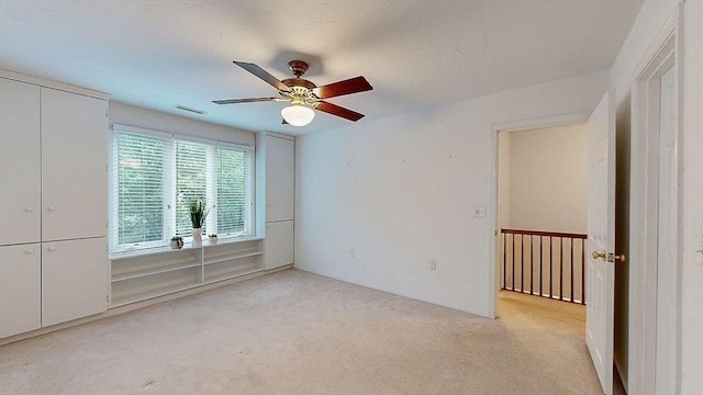 33 Cobblestone Ln Unit 33, Worcester, MA 01606 - unfurnished bedroom featuring light carpet and ceiling fan