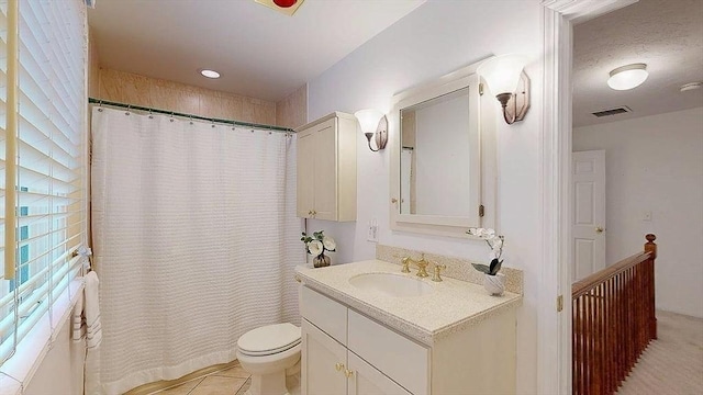 33 Cobblestone Ln Unit 33, Worcester, MA 01606 - bathroom featuring vanity, toilet, and curtained shower