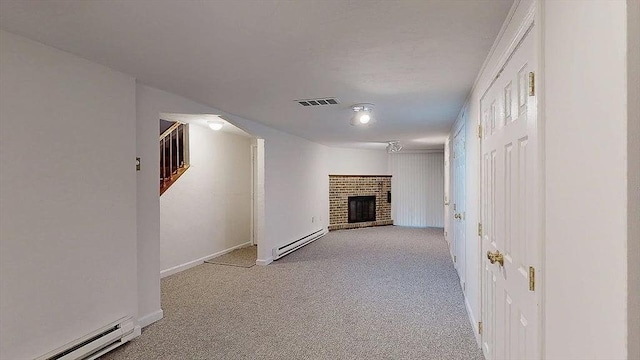 33 Cobblestone Ln Unit 33, Worcester, MA 01606 - hallway featuring a baseboard heating unit, carpet, and baseboards