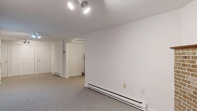 33 Cobblestone Ln Unit 33, Worcester, MA 01606 - unfurnished room with a baseboard heating unit, carpet floors, and baseboards