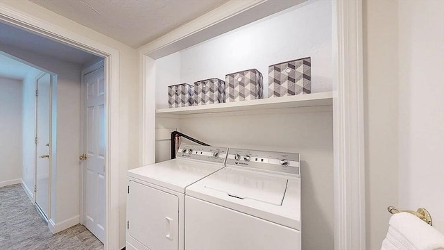 33 Cobblestone Ln Unit 33, Worcester, MA 01606 - laundry room featuring separate washer and dryer and baseboards