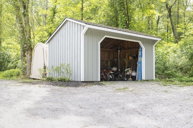 697 Rte 197, Woodstock, CT 06281 - view of outbuilding featuring a wooded view