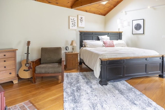 697 Rte 197, Woodstock, CT 06281 - bedroom with light wood-style flooring, wood ceiling, and a skylight