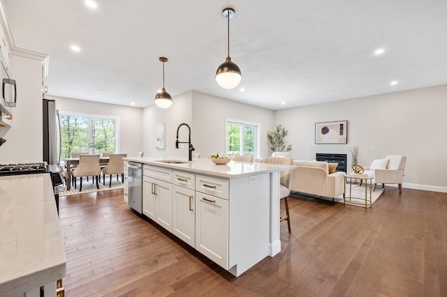 59A Mount Ave, Worcester, MA 01606 - kitchen with a sink, dishwasher, healthy amount of natural light, white cabinetry, and recessed lighting