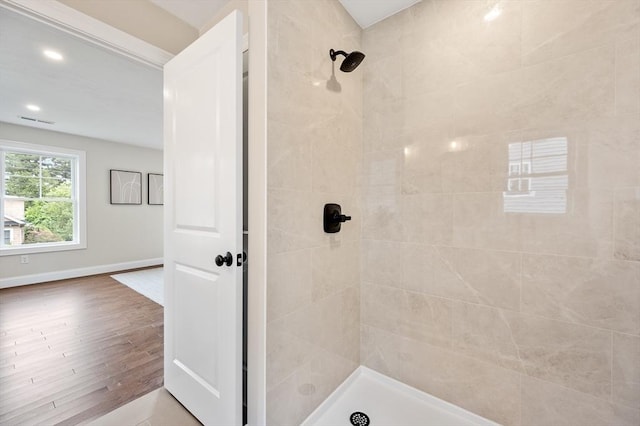 59A Mount Ave, Worcester, MA 01606 - bathroom with a tile shower, wood finished floors, baseboards, and recessed lighting