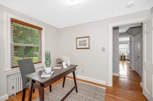 15 Eustis Ave, Wakefield, MA 01880 - office space featuring radiator heating unit, baseboards, and wood finished floors