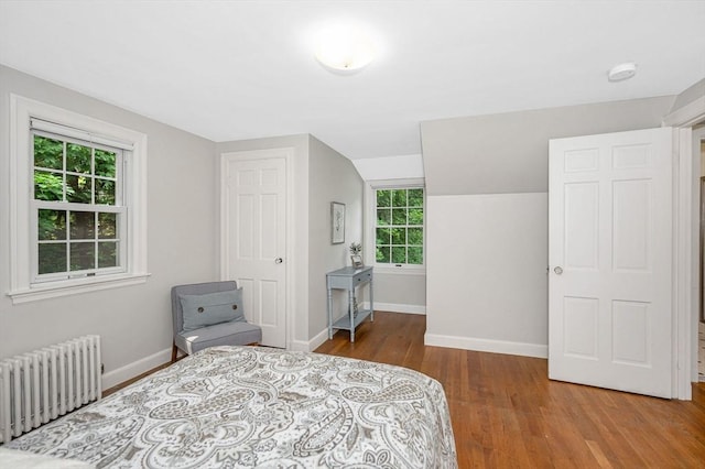 15 Eustis Ave, Wakefield, MA 01880 - bedroom featuring radiator, wood finished floors, and baseboards