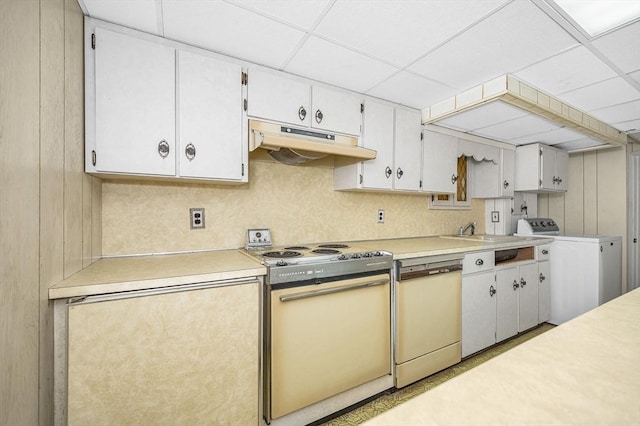 15 Eustis Ave, Wakefield, MA 01880 - kitchen featuring under cabinet range hood, dishwashing machine, range with electric cooktop, washer / dryer, and a sink