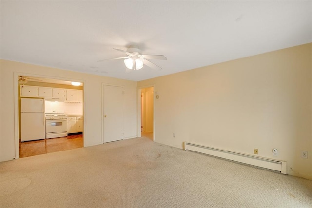 unfurnished bedroom with ceiling fan, white fridge, baseboard heating, and light carpet