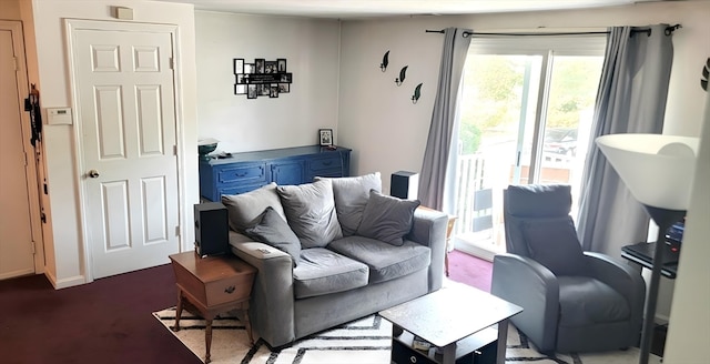 carpeted living room featuring a wealth of natural light