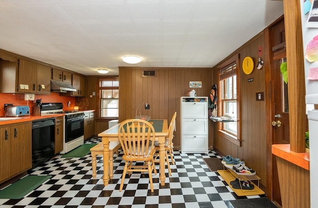30 Everett St, Woburn, MA 01801 - dining area with dark flooring and wooden walls