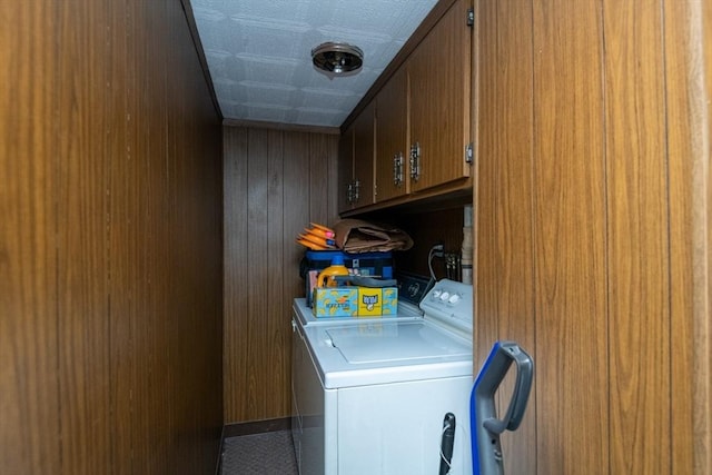 30 Everett St, Woburn, MA 01801 - washroom with cabinet space, independent washer and dryer, and wood walls