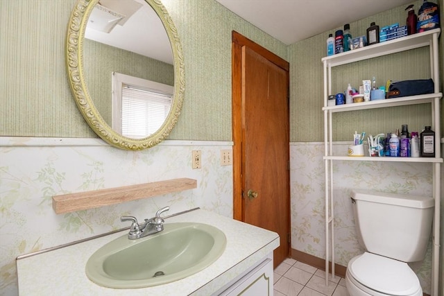 30 Everett St, Woburn, MA 01801 - bathroom featuring vanity, toilet, tile patterned floors, and wallpapered walls
