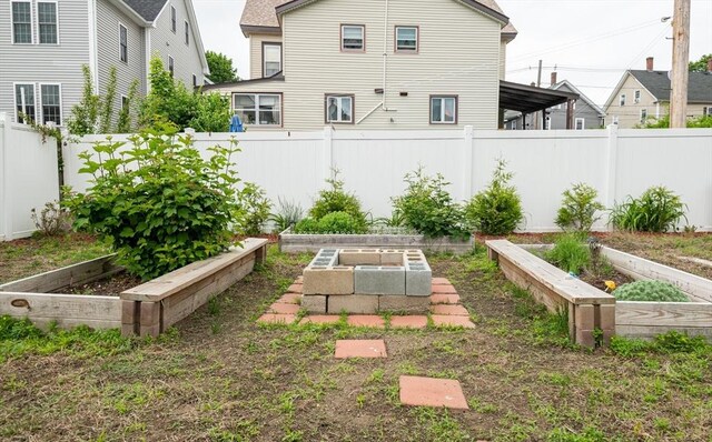 30 Everett St, Woburn, MA 01801 - view of yard featuring a vegetable garden