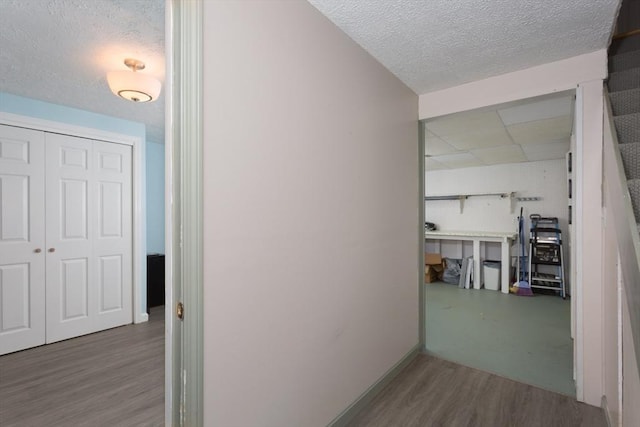 29 Benjamin Landing Ln Unit 29, Franklin, MA 02038 - hall with wood finished floors, a textured ceiling, and baseboards