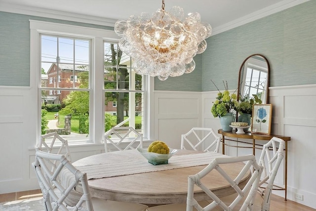 1 Beech Tree Ln, Lexington, MA 02421 - dining room with a chandelier, a decorative wall, a wainscoted wall, plenty of natural light, and light wood-type flooring