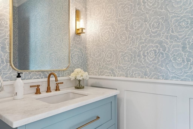 1 Beech Tree Ln, Lexington, MA 02421 - bathroom featuring wallpapered walls, a wainscoted wall, and vanity