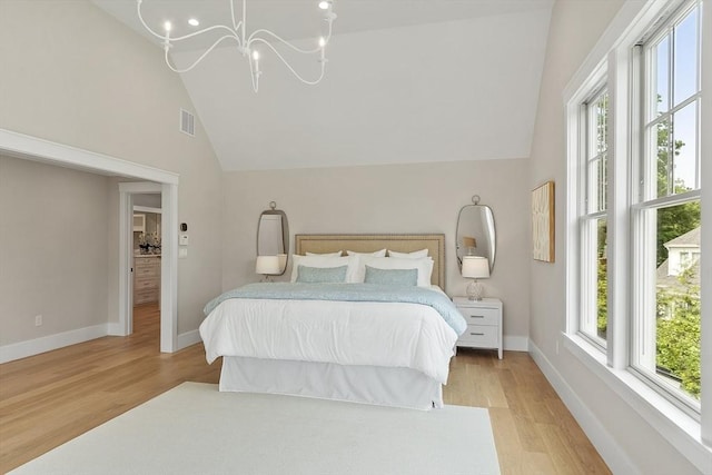 1 Beech Tree Ln, Lexington, MA 02421 - bedroom with light wood-style flooring, a chandelier, baseboards, and high vaulted ceiling