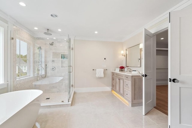 1 Beech Tree Ln, Lexington, MA 02421 - bathroom with crown molding, a shower stall, baseboards, vanity, and a freestanding tub