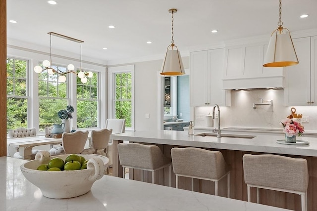 1 Beech Tree Ln, Lexington, MA 02421 - kitchen with white cabinets, decorative light fixtures, recessed lighting, and ornamental molding