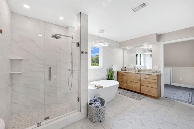 24 Azalea Way, Belchertown, MA 01007 - full bathroom featuring a shower stall, vanity, a freestanding bath, and recessed lighting