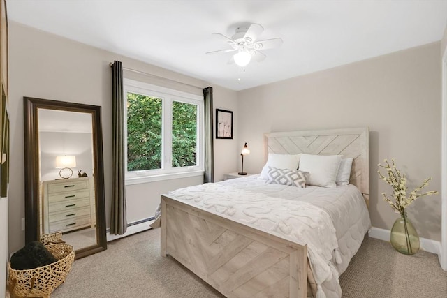24 Azalea Way, Belchertown, MA 01007 - bedroom with light colored carpet, a baseboard radiator, and ceiling fan