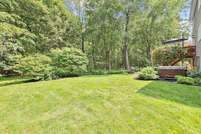 24 Azalea Way, Belchertown, MA 01007 - view of green lawn featuring a hot tub
