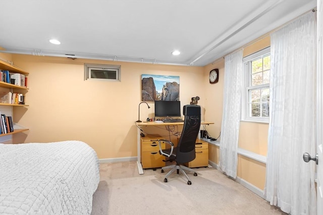carpeted bedroom featuring an office area, baseboards, and recessed lighting