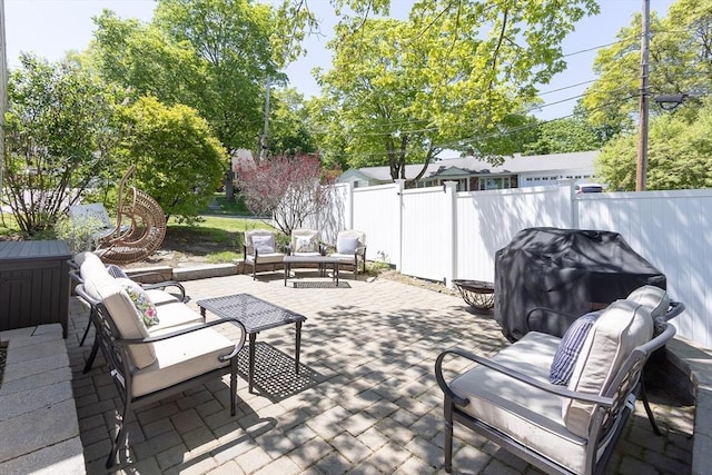 view of patio / terrace featuring fence, an outdoor hangout area, and area for grilling