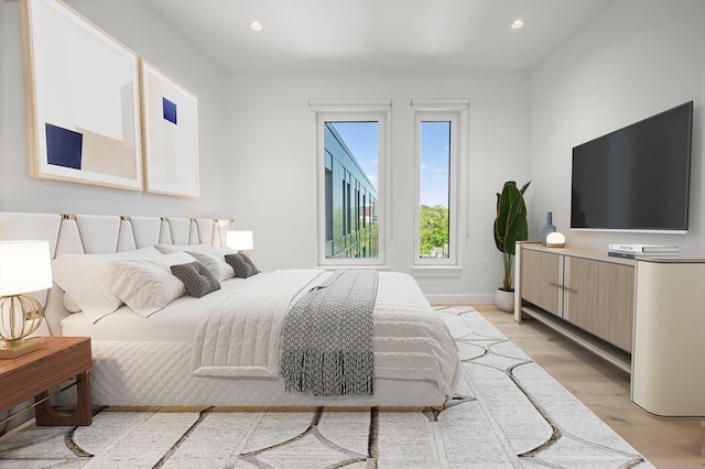 2149 Washington St Unit 601, Boston, MA 02119 - bedroom featuring light wood-style flooring, recessed lighting, and baseboards