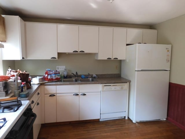12C Oliver St Unit 12C, Haverhill, MA 01832 - kitchen featuring white appliances, a sink, dark wood-style flooring, and white cabinets