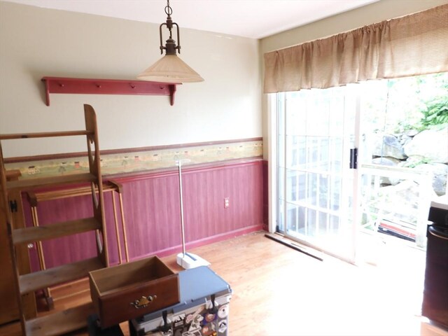 12C Oliver St Unit 12C, Haverhill, MA 01832 - dining space with a wainscoted wall and wood finished floors