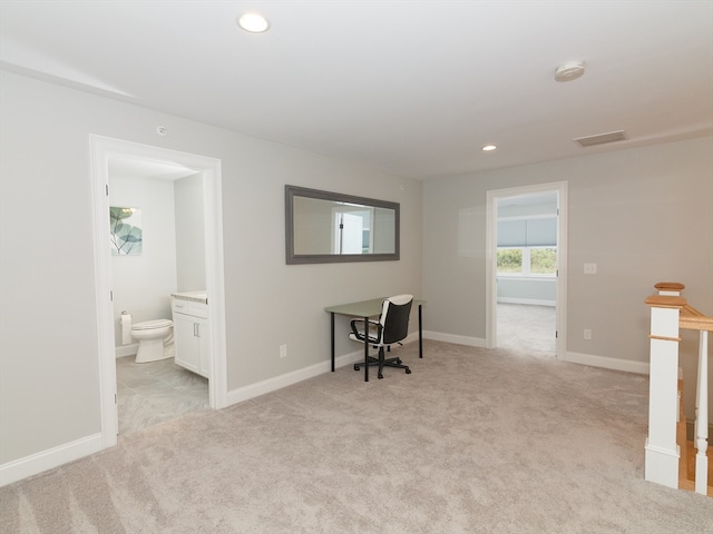 interior space featuring light colored carpet