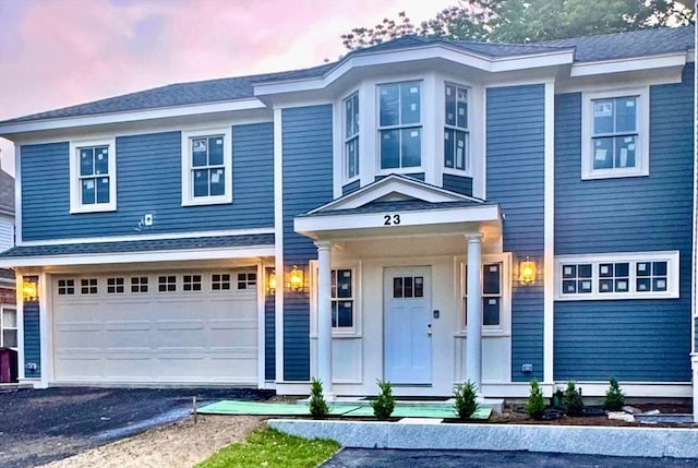 23 Francis St Unit 23, Newton, MA 02459 - view of front of home with an attached garage and asphalt driveway