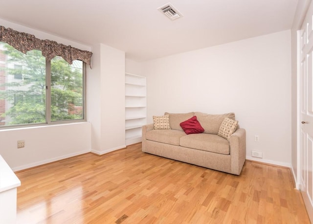 173 Oak Unit 208W, Newton, MA 02464 - sitting room featuring light wood finished floors and baseboards