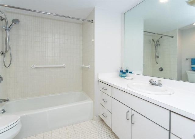 173 Oak Unit 208W, Newton, MA 02464 - full bath featuring vanity, washtub / shower combination, and tile patterned floors