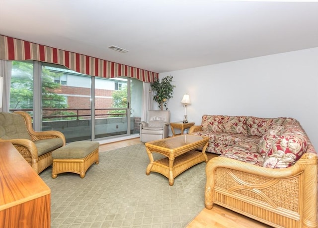 173 Oak Unit 208W, Newton, MA 02464 - living area featuring wood finished floors