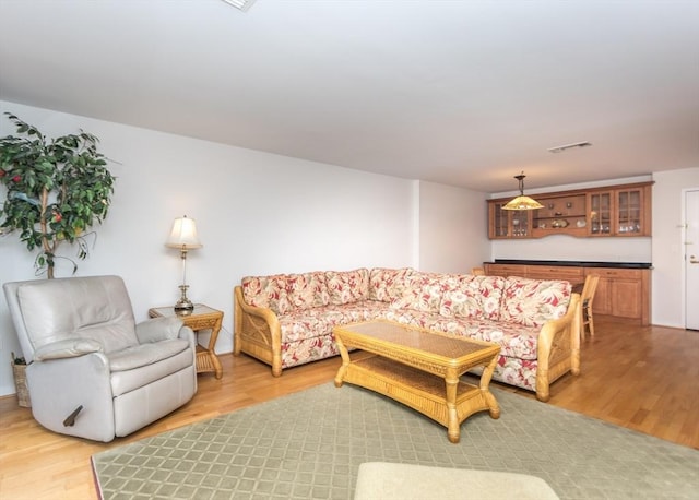 173 Oak Unit 208W, Newton, MA 02464 - living area with light wood-style floors