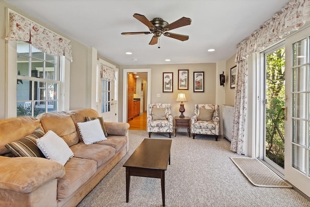 living area featuring ceiling fan, carpet flooring, and recessed lighting