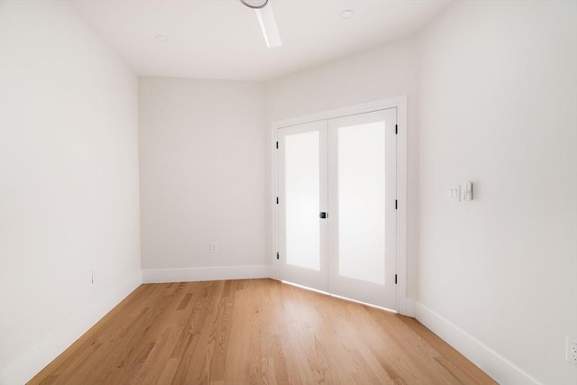 unfurnished room featuring light wood-type flooring