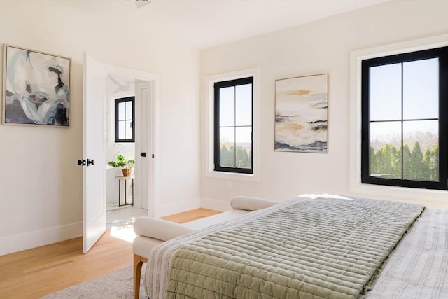 bedroom featuring hardwood / wood-style flooring