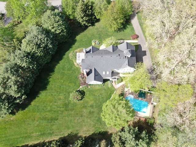view of subject property featuring a pool area