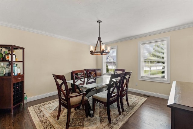 27 Nadias Way, Brockton, MA 02301 - dining space featuring crown molding, baseboards, dark wood-style floors, and a chandelier