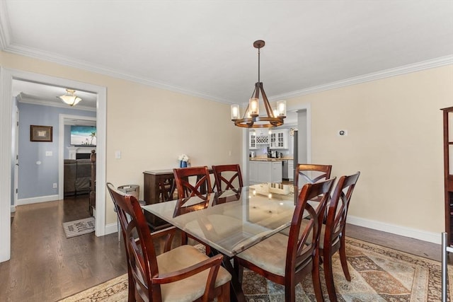 27 Nadias Way, Brockton, MA 02301 - dining space with a chandelier, wood finished floors, crown molding, and baseboards