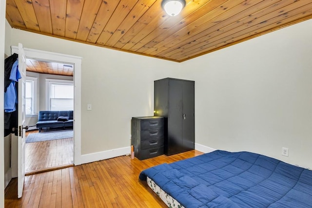 38 Cliff St, Fitchburg, MA 01420 - bedroom featuring wooden ceiling, crown molding, baseboards, light wood-type flooring, and a baseboard radiator