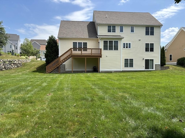 34 Winship Dr, Stoneham, MA 02180 - rear view of house featuring stairs, a deck, and a yard