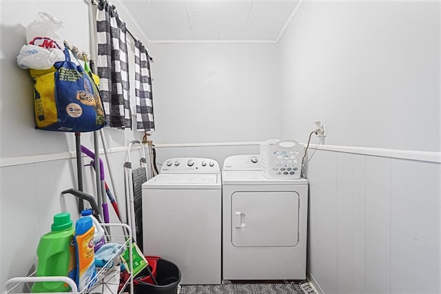 19 Chester St, Fitchburg, MA 01420 - laundry room featuring separate washer and dryer, ornamental molding, a wainscoted wall, and a decorative wall