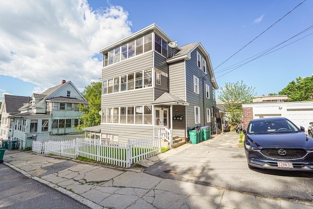 19 Chester St, Fitchburg, MA 01420 - view of front of house with a fenced front yard